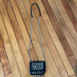 Fun metal and faux leather mini crossbody